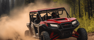 A high resolution advertisement photo of a bright red 2023 5-seat side-by-side utility terrain vehicle driving down a dirt road through a pine forest.